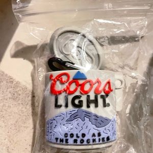 A beer can ( coorse light ) air pod 1 and 2 ..